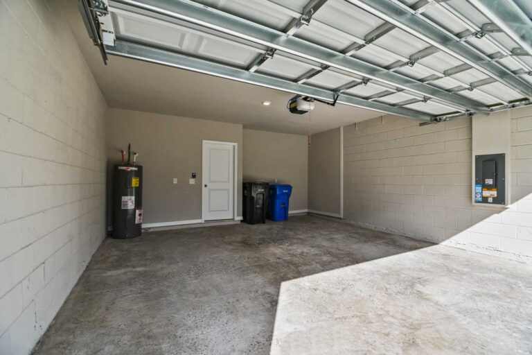 Townhome garage with hot water heater