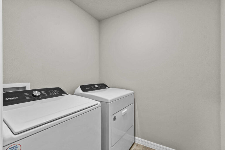 Townhome laundry room with washer and dryer